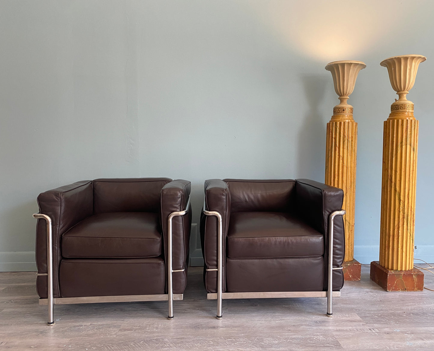 Replica Corbusier LC2 Chairs Chocolate Brown Leather Found at Studio Maxxima.